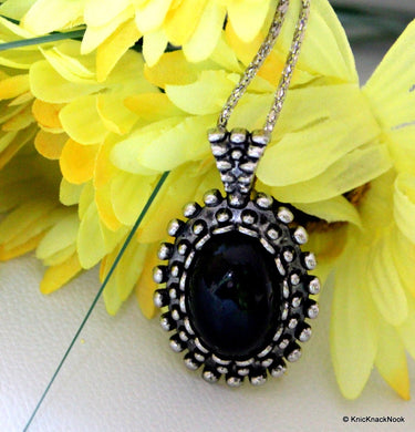 Black and Silver Tone Pendant